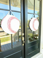 Load image into Gallery viewer, baseball door hangers on black glass doors
