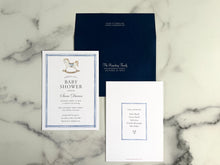 Load image into Gallery viewer, watercolor rocking horse baby shower invitation with navy envelope