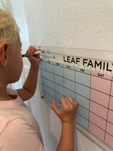 Load image into Gallery viewer, acrylic chore board with child filling it out