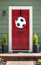 Load image into Gallery viewer, soccer door hanger on red front door
