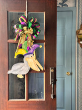 Load image into Gallery viewer, watercolor pelican with mardi gras jester hat door hanger
