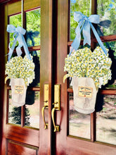 Load image into Gallery viewer, Lilly of the Valley in French Champagne Bucket Door Hanger on double french wooden doors
