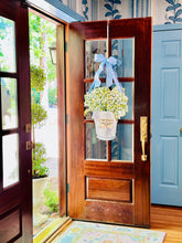 Load image into Gallery viewer, Lilly of the Valley in French Champagne Bucket Door Hanger on french wooden doors
